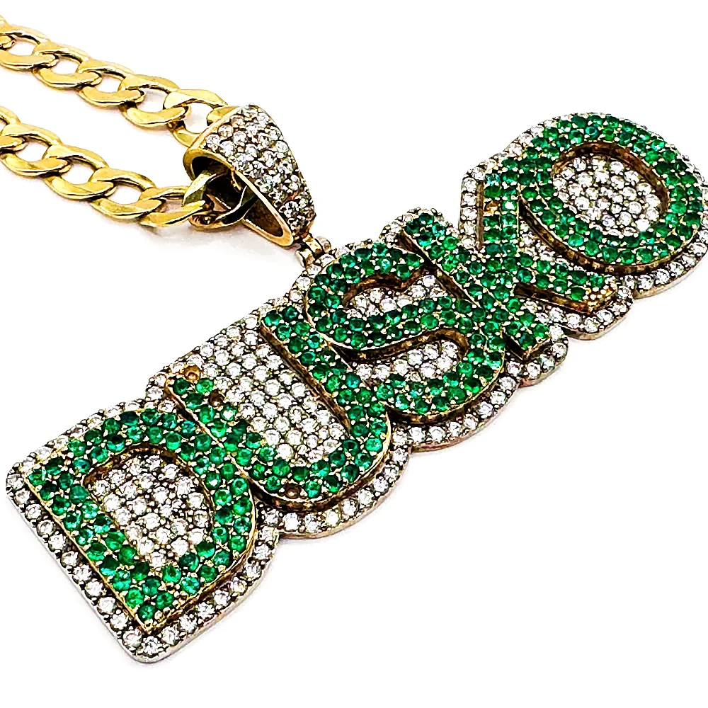 Custom emerald and diamond name pendant on a gold chain